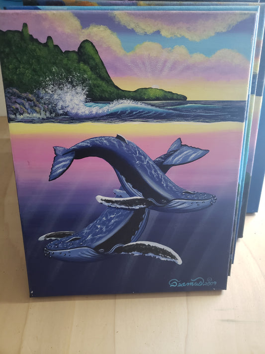 2 whales swimming